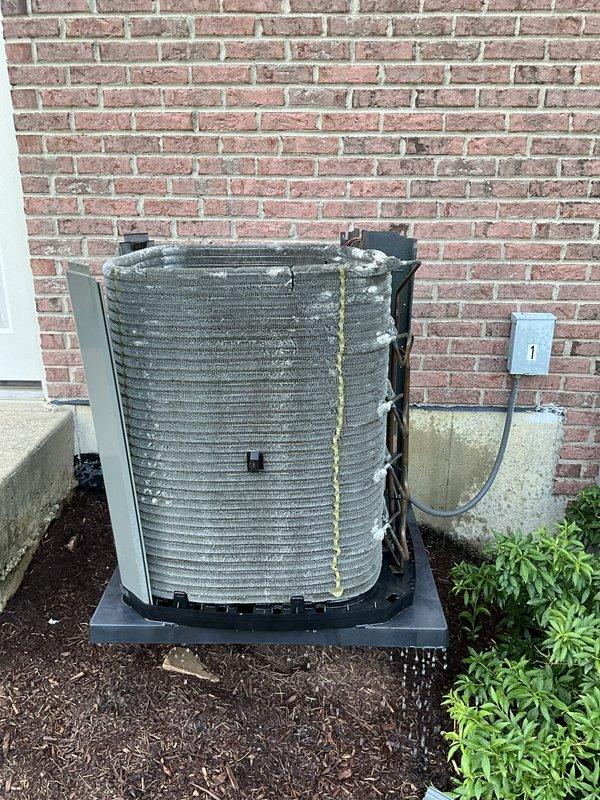 Completed comprehensive BFMA tune-up service on two aging air conditioning systems, both over 15 years old. Performed full maintenance inspection of outdoor condenser unit, including coil cleaning and electrical component verification, with disconnect box confirmed operational. Inspected and documented condition of indoor air handling unit with heavily soiled 24-panel mesh air filter showing significant dust and debris accumulation, indicating need for replacement to maintain proper airflow and system efficiency.