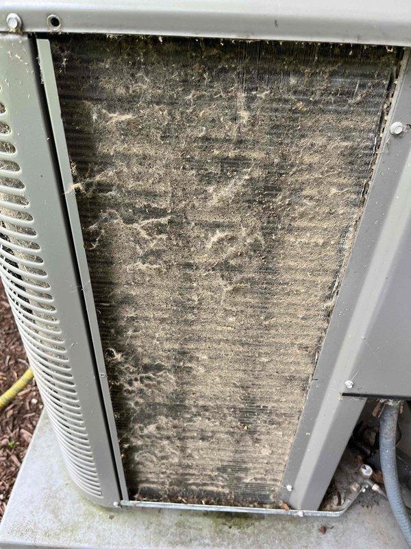 Completed comprehensive BFMA tune-up service on 4-year-old Lennox outdoor condensing unit. Upon inspection, discovered heavily soiled condenser coil with significant accumulation of dust, lint, and debris obstructing airflow and reducing heat transfer efficiency. Performed thorough coil cleaning to restore optimal performance, inspected refrigerant lines and electrical connections, verified proper operation of all components, and ensured unit was functioning within manufacturer specifications.