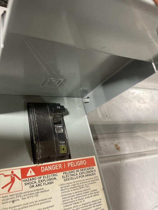 Performed nitrogen leak check on HVAC system after identifying low refrigerant condition indicating system leak. Pressurized refrigerant circuit with nitrogen to locate source of refrigerant loss and documented equipment location in basement utility area for repair assessment.
