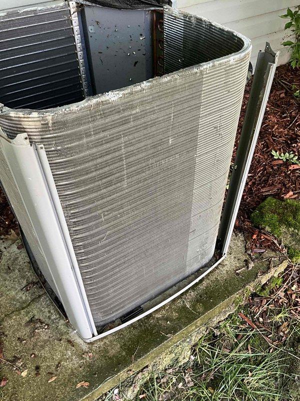 Completed comprehensive BFMA tune-up on residential outdoor AC condenser unit aged 1+ years. Upon inspection, discovered heavily clogged filter with significant accumulation of dust, debris, and organic matter restricting airflow. Cleaned condenser coils, removed debris from unit top and surrounding area, serviced filter, and verified system operation. Unit restored to proper working condition with improved airflow efficiency.
