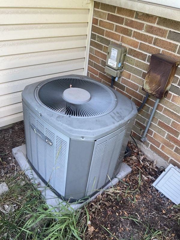 Completed comprehensive AC tune-up on 21-year-old residential cooling system. Performed standard maintenance protocol including inspection of evaporator coils, condenser coils, and refrigerant lines, all of which showed significant dust and debris accumulation consistent with the unit's age. Inspected outdoor condenser unit, electrical disconnect, and all associated components to ensure proper system operation.