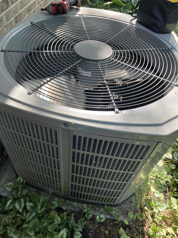 Completed comprehensive air conditioning tune-up on outdoor condenser unit estimated to be 5-9 years old. Performed standard preventive maintenance protocol including inspection of fan motor and blades, cleaning of condenser coils, verification of refrigerant levels, testing of electrical connections and capacitors, and overall system performance evaluation. Unit found to be in functional condition with no immediate repairs required; all components operating within normal parameters upon completion of service.
