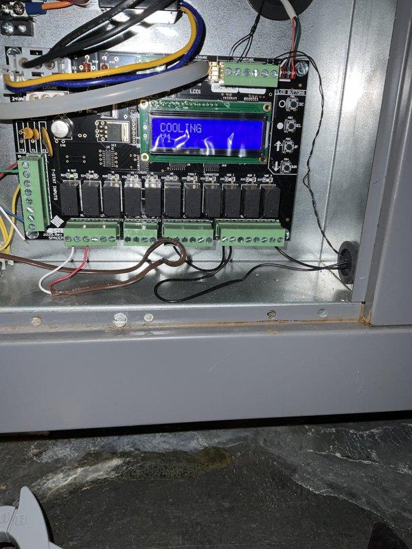 Responded to no cooling complaint on SpacePak high-velocity system located in attic. Upon arrival, confirmed outdoor condensing unit operating normally but indoor air handler blower not performing adequately. Inspected SpacePak control board displaying "COOLING" mode and verified all electrical connections and wiring at control panel. Evaluated system operation, ductwork connections, and condensate pan installation. System approximately 5 years old with smart thermostat installed.