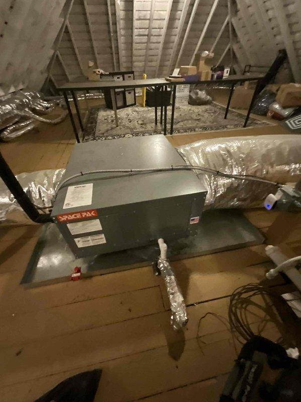 Responded to no cooling complaint on SpacePak high-velocity system located in attic. Upon arrival, confirmed outdoor condensing unit operating normally but indoor air handler blower not performing adequately. Inspected SpacePak control board displaying "COOLING" mode and verified all electrical connections and wiring at control panel. Evaluated system operation, ductwork connections, and condensate pan installation. System approximately 5 years old with smart thermostat installed.