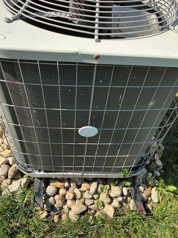 Completed comprehensive BFMA tune-up on 6+ year old HVAC system as first call of the day. Performed electrical diagnostics on outdoor condensing unit using clamp meter, recording amperage readings of 30.75 amps to verify proper compressor operation and system performance. Inspected condenser coil, fan assembly, and all exterior components, confirming unit operational status with no visible defects or required repairs.