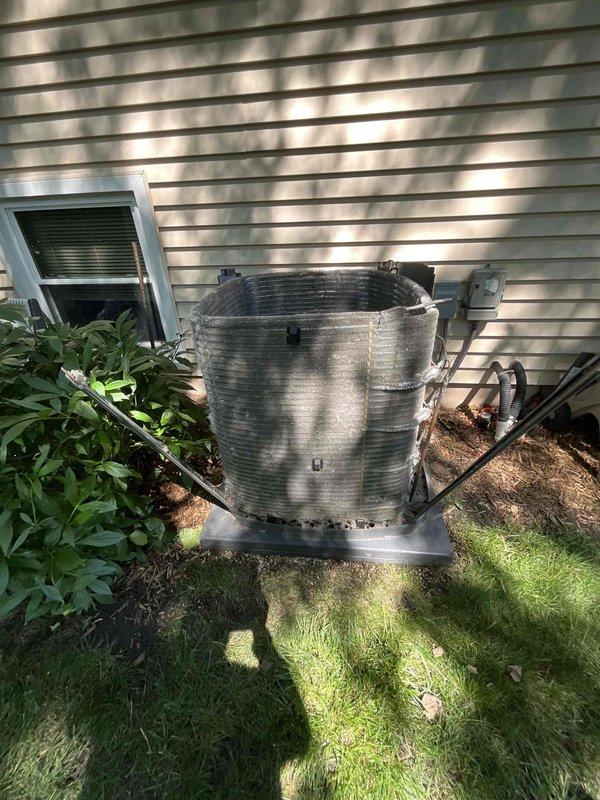 Completed comprehensive BFMA tune-up on residential air conditioning system. Performed full system inspection of outdoor condenser unit and indoor evaporator coil assembly. Evaporator coil showed moderate dust accumulation between fins and visible damage with tears in coil casing, potentially affecting system efficiency and requiring monitoring for refrigerant leaks. Condenser unit operating normally with standard weathering, properly mounted on concrete pad with secure refrigerant line connections. Documented equipment condition with photographic evidence for maintenance records.