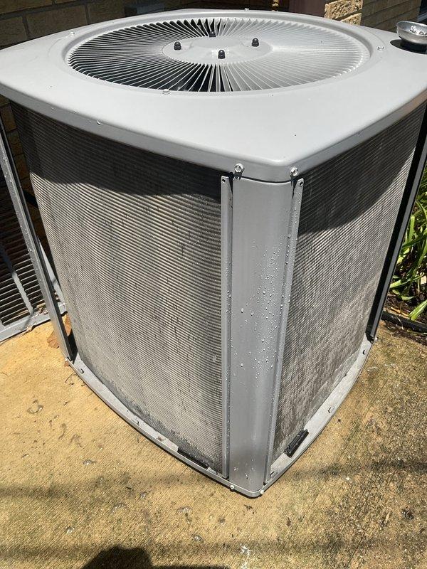Completed comprehensive BFMA tune-up service on residential air conditioning system aged 4+ years. Performed full system inspection of outdoor condensing unit, verified proper operation of compressor and condenser fan motor, cleaned condenser coils and exterior surfaces, checked refrigerant levels and pressures, inspected electrical connections and contactors, and confirmed unit is operating within manufacturer specifications. System is functioning properly with no deficiencies noted at time of service.