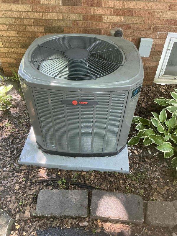 Completed comprehensive BFMA tune-up service on Trane air conditioning system. Performed complete system inspection of outdoor condenser unit, verified proper operation of compressor and fan motor, and checked refrigerant levels. Inspected and documented AprilAire whole-home air filtration system with pleated media filter (Stock No. 213). Confirmed all components operating within manufacturer specifications, electrical connections secure, and unit mounted properly on concrete pad with adequate clearance. System tested and left in full operational status with no deficiencies noted.