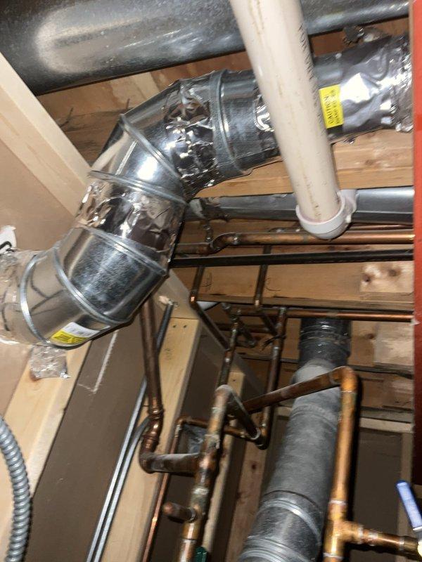 Responded to service call regarding slow drip observed at two locations near basement ductwork. Performed thorough inspection of HVAC system including attic installation, ductwork, and condensate drainage components. Examined flexible duct connections, metallic ductwork transitions, and all visible piping systems including copper refrigerant lines and condensate drain lines. Verified proper insulation on refrigerant lines and checked for signs of excessive condensation on duct surfaces. Inspected condensate drain system for proper pitch and drainage, cleared any potential blockages, and confirmed drain line integrity. Assessed system operation under current high ambient temperature conditions and verified thermostat settings. Explained to homeowner that condensation on ductwork and associated components is normal during periods of high humidity and temperature differential, particularly when maintaining lower indoor temperatures. Recommended monitoring the drip locations and provided g