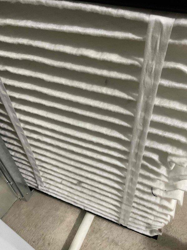 Completed comprehensive BFMA tune-up service on Carrier outdoor condensing unit, including inspection of condenser coils, electrical connections, and refrigerant levels. Addressed primary concern of approximately five gallons of condensation backup in PVC drain line by clearing blockage and verifying proper drainage flow. Additionally performed dryer vent cleaning and maintenance as part of scheduled service protocol.