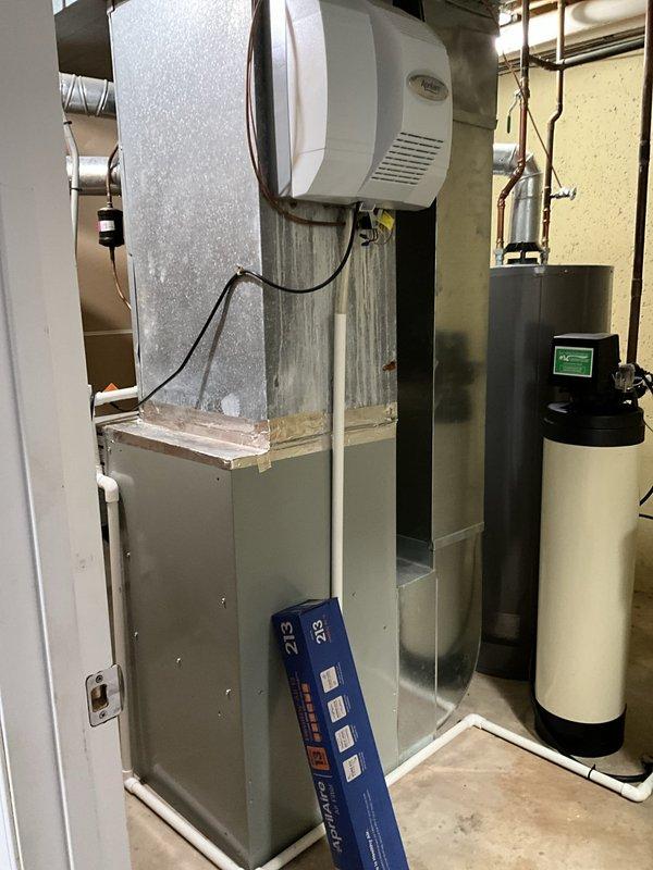 Completed semi-annual BFMA tune-up service on 12-year-old HVAC system including both heating and cooling components. Performed comprehensive maintenance on basement furnace unit with mounted humidifier, replaced air filter, and serviced outdoor condensing unit. All equipment inspected, tested, and confirmed operating within normal parameters.