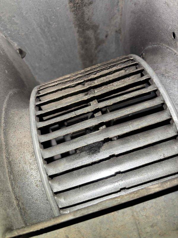 Responded to residential no cooling call where client suspected blower motor failure. Upon inspection of the air handler unit, verified blower motor operation and found system airflow was restricted due to accumulated debris and dust buildup on the return air grate and surrounding ductwork. Cleaned return air louvers and inspected electrical connections, which showed normal operation. Verified proper voltage to blower motor and confirmed unit cycling correctly. System restored to normal cooling operation with adequate airflow throughout.