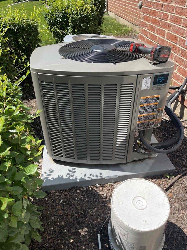 Completed comprehensive BFMA tune-up on residential air conditioning system. Upon arrival, found outdoor condenser unit with severely clogged air filter screen heavily contaminated with dirt, dust, leaves, and organic debris that was significantly restricting airflow and reducing system efficiency. Removed and cleaned filter assembly, removing all accumulated material from mesh surface. Performed standard AC maintenance protocol including inspection of condenser coils, verification of refrigerant lines, electrical connections, and disconnect box functionality. Unit tested and confirmed operating within normal parameters following service completion.