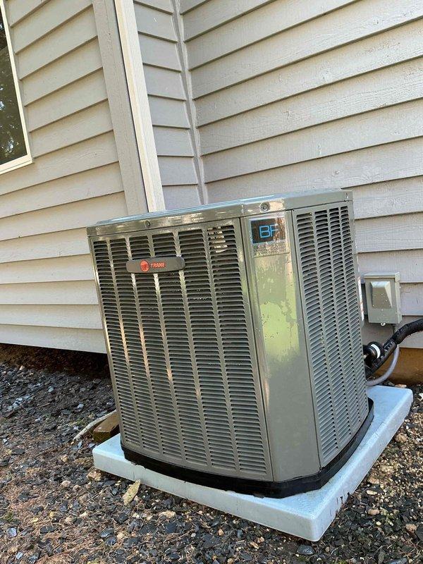 Completed comprehensive BFMA preventive maintenance tune-up on a 10-month-old Trane air conditioning system. Performed full system inspection including condenser unit evaluation, verified proper electrical connections and wiring integrity, checked refrigerant levels, cleaned condenser coils showing minor exterior weathering and algae accumulation, inspected blower motor assembly and associated components, tested system operation and airflow, and confirmed all safety controls functioning properly. Unit operating within manufacturer specifications with no deficiencies noted at time of service.