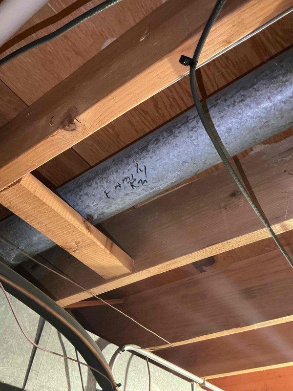 Responded to customer concerns regarding thermostat malfunction and uneven temperature distribution throughout the home, with the family room experiencing excessive cooling. Upon inspection, accessed attic space and examined the ductwork system, including main supply ducts and branch lines serving affected areas. Documented existing HVAC infrastructure conditions, including galvanized metal ductwork routing, insulation placement, and cable management within the ceiling cavity. Verified proper airflow distribution and identified potential issues contributing to temperature imbalances between rooms.