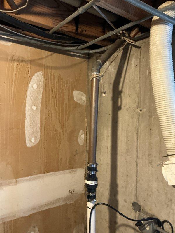 Conducted comprehensive HVAC system evaluation for residential property requiring air conditioning and evaporator coil replacement estimate. Assessed exterior utility area where existing AC condenser unit connects to home's electrical service and refrigerant line sets. Documented current equipment configuration including electrical connections, conduit routing, and concrete pad condition for outdoor unit placement. 

Inspected unfinished basement mechanical space to evaluate indoor furnace and evaporator coil accessibility. Examined existing ductwork distribution system, including flexible supply ducts and air distribution infrastructure. Assessed clearances around furnace cabinet and available workspace for coil replacement procedures. Documented electrical service routing, support structures, and mechanical room layout to determine installation requirements and system compatibility for proposed equipment upgrade.