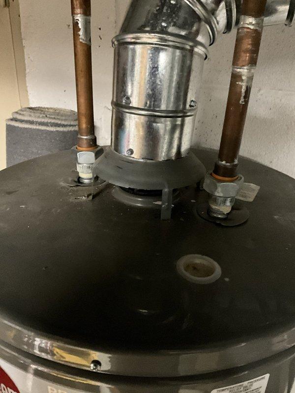 Responded to service call for residential water heater evaluation. Upon inspection, identified draft vent concerns on tanked water heater requiring proper venting assessment to ensure safe combustion gas exhaust. Also documented sump pump operational issues and active drain leak requiring attention. Recommended licensed plumber follow-up for comprehensive repair of water heater venting system, sump pump malfunction, and drain leak remediation to restore proper function and prevent water damage.