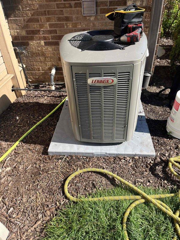 Completed comprehensive BFMA tune-up service on an 11-month-old Lennox air conditioning system. Performed preventive maintenance inspection of outdoor condenser unit, cleaned condenser coils, checked refrigerant levels and pressures, verified electrical connections, tested capacitor and contactor operation, and inspected filter screen which showed moderate dust accumulation. All system components operating within manufacturer specifications upon completion.