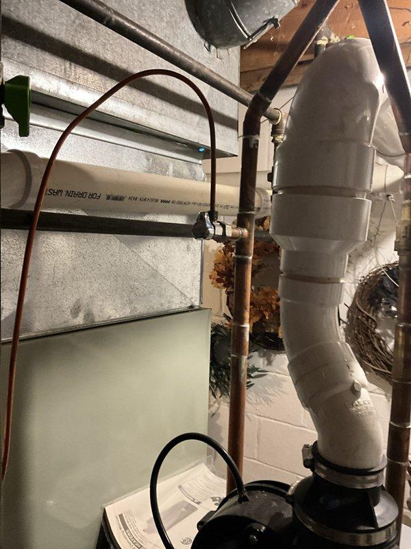 Responded to water leak complaint and successfully replaced defective angle stop valve on copper supply line. The existing valve exhibited significant corrosion and deterioration, which was causing the leak at the connection point. Shut off main water supply, removed the failed angle stop, cleaned and prepared the copper pipe connection, and installed new angle stop valve. Restored water service, tested the new installation for proper operation and verified no leaks present. System returned to full functionality.