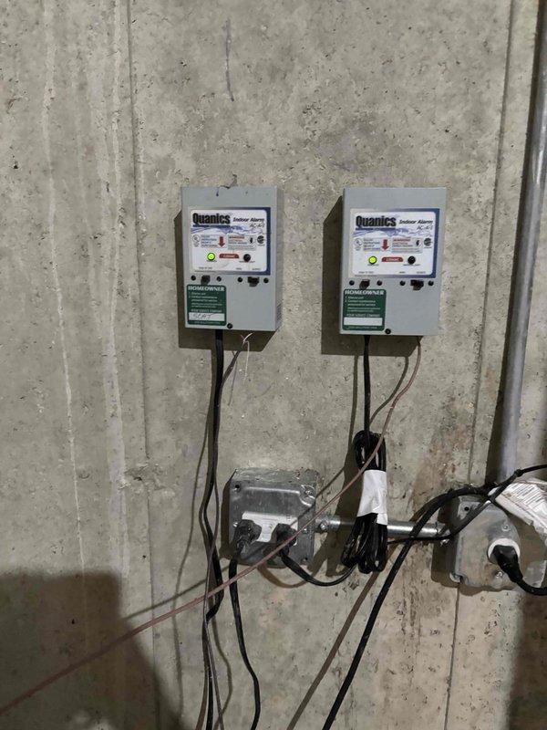 Responded to commercial no cooling call for rooftop unit. Upon arrival, inspected RTU electrical controls and found system power issues at the control panel. Documented existing electrical infrastructure including dual control units and junction box configuration for future reference and troubleshooting purposes.
