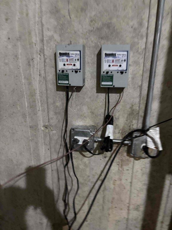 Responded to commercial no cooling call for rooftop unit. Upon arrival, inspected RTU electrical controls and found system power issues at the control panel. Documented existing electrical infrastructure including dual control units and junction box configuration for future reference and troubleshooting purposes.