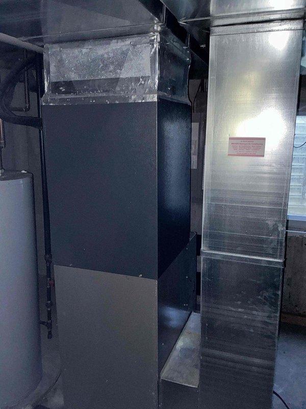 Completed full HVAC system replacement for 20+ year old equipment in residential basement mechanical room. Removed and replaced existing furnace/air handler unit and associated ductwork connections, ensuring proper plenum installation and duct transitions. Coordinated arrival window with homeowner and verified all new equipment installations met manufacturer specifications and current code requirements.