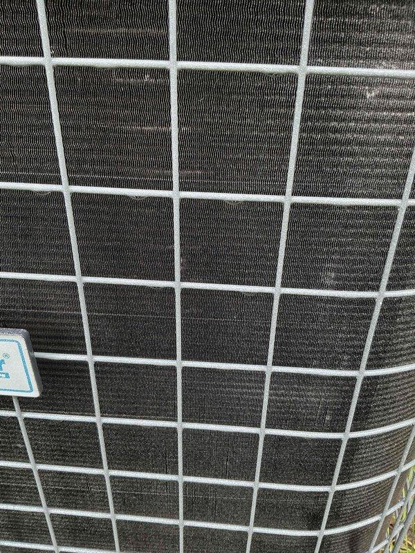 Completed comprehensive BFMA tune-up service on 7+ year old air conditioning system during morning appointment window. Performed full system inspection of outdoor condensing unit, verifying condenser coil condition and protective wire guard integrity. Replaced dirty air filter with new unit to restore proper airflow and system efficiency.