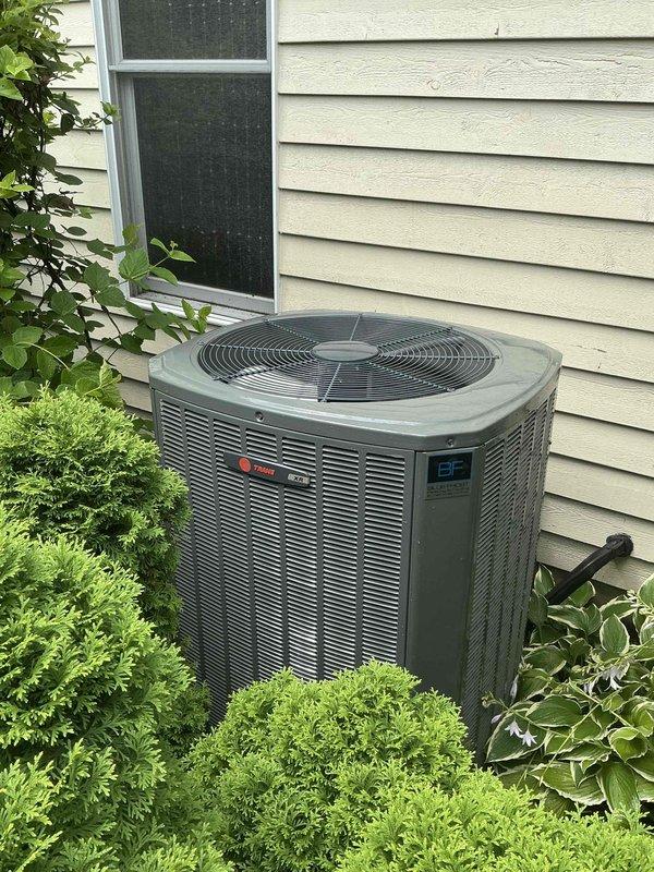 Completed comprehensive HVAC tune-up on Trane outdoor condensing unit and associated air handler system. Performed full system inspection, replaced air filter with new pleated media filter, verified proper airflow and refrigerant levels, and confirmed all components operating within manufacturer specifications. Customer contacted 30 minutes prior to arrival per service protocol, and system is now functioning optimally for the cooling season.