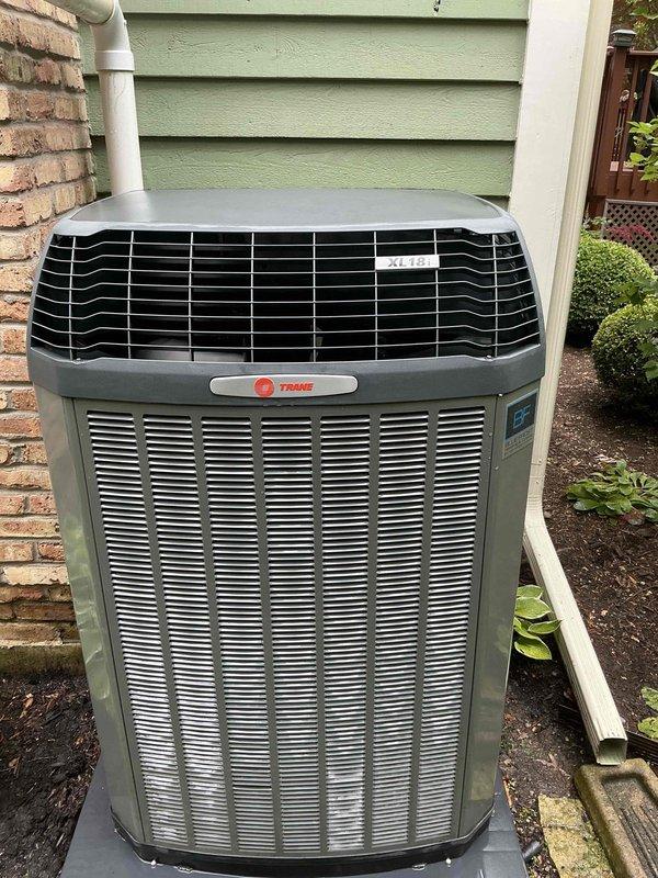 Completed comprehensive BFMA tune-up service on 7-year-old Trane air conditioning system. Performed thorough inspection of outdoor condenser unit, which exhibited significant accumulation of dirt, dust, and debris throughout the aluminum cooling fins requiring detailed cleaning to restore proper airflow and heat transfer efficiency. Cleaned condenser coils, checked refrigerant levels, inspected electrical connections, verified proper operation of all system components, and ensured unit was functioning within manufacturer specifications for optimal cooling performance.