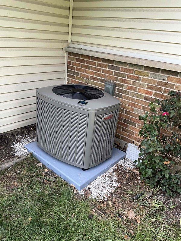 Completed full HVAC system installation consisting of a Lennox SL280DF070V36A downflow gas furnace and EL16XC1-030 air conditioning condenser unit. Installed CK40DT-24A-71 evaporator coil with AHRI-matched configuration for optimal system performance. Integrated AA1410 air filtration system, P200 thermostat, and powered humidifier into the new system. Established refrigerant lines with proper insulation and secured all electrical connections per manufacturer specifications. Mounted outdoor condenser unit on concrete pad with gravel base and installed protective metal conduit for line set routing along exterior wall. Performed system startup procedures and utilized Testo 557 digital manifold gauges to verify refrigerant pressures and temperatures, confirming proper system operation. All equipment tested and operational upon completion.