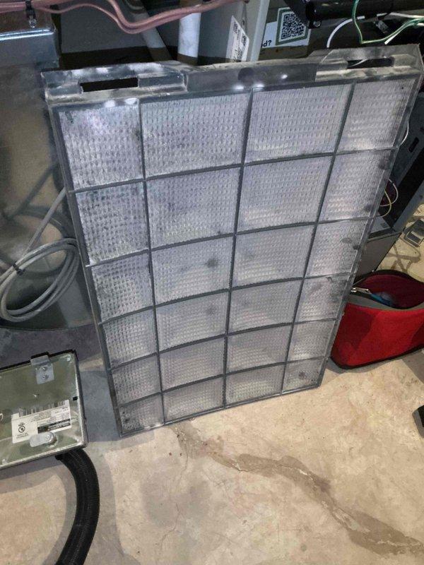Performed comprehensive HVAC maintenance service including dual air conditioning system tune-ups. Inspected and tested electrical components, verified proper voltage and amperage readings using diagnostic meter. Removed, cleaned, and reinstalled electronic air cleaner filter media, removing accumulated dust and debris from 16-section filtration system. Completed dryer vent cleaning service to ensure proper exhaust airflow and reduce fire hazard risk. Replaced main control circuit board in Trane furnace unit under manufacturer's warranty coverage. All systems tested and confirmed operational upon completion.