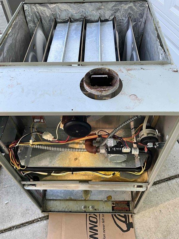 Completed full HVAC system replacement including installation of EL297UH110XV60C two-stage variable-speed 97% AFUE gas furnace, EL16KC1-060 air conditioning condenser unit, and CK40CT-60C-071 evaporator coil. Reinstalled existing thermostat, integrated powered humidifier into new system, and installed complimentary water heater. Protected work areas with drop cloths throughout installation, removed and properly disposed of old equipment, completed all electrical connections and gas line hookups, tested system operation for proper heating and cooling cycles, and verified all safety controls functioning correctly.
