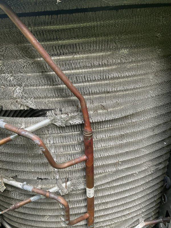 Completed comprehensive BFMA tune-up service on three AC units, including thorough inspection of evaporator coils, refrigerant lines, and heat exchanger components. Performed semi-annual filter changes, replacing 20x25x5 and 16x25x5 filters as part of recurring maintenance program. All copper refrigerant lines, coil assemblies, and connections inspected and found operational with normal wear patterns consistent with outdoor installation; systems tested and confirmed functioning properly.