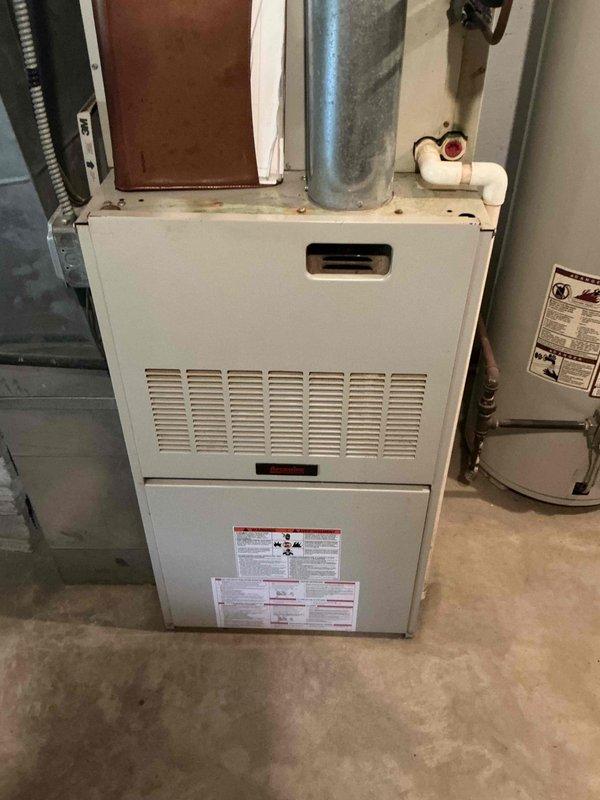 Completed comprehensive HVAC estimate for replacement of 30+ year old air conditioning system and evaporator coil. Client's existing equipment had failed completely, leaving property without cooling capabilities. Assessed current furnace and ductwork configuration in basement utility area, documenting existing galvanized ductwork system and copper refrigerant line routing. Provided recommendations for new AC condenser unit and compatible indoor evaporator coil to integrate with existing forced-air system, prioritizing expedited installation timeline due to urgent cooling needs.