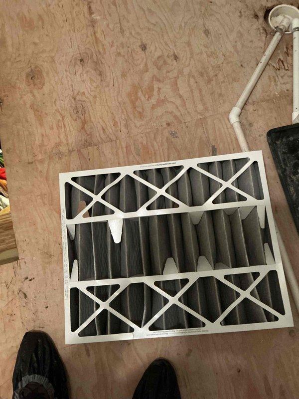 Completed comprehensive BFMA tune-up service on residential air conditioning system, including full inspection of outdoor condenser unit with corrugated heat exchanger coils and refrigerant line connections. Performed semi-annual filter change, replacing used filter media with fresh unit to maintain optimal airflow and system efficiency. All components inspected and found operating within normal parameters, with equipment confirmed in good working condition for continued seasonal operation.