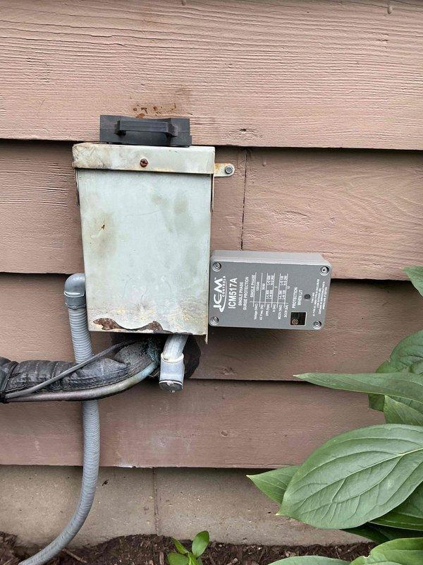 Replaced failed condenser fan motor and dual run capacitor on outdoor condensing unit. Installed IOTA DLS-17A surge protection device at exterior disconnect to protect equipment from voltage spikes and power surges. Verified proper fan operation, electrical connections, and system functionality upon completion. Parts were pre-staged at headquarters prior to service call.