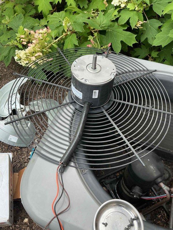 Replaced failed condenser fan motor and dual run capacitor on outdoor condensing unit. Installed IOTA DLS-17A surge protection device at exterior disconnect to protect equipment from voltage spikes and power surges. Verified proper fan operation, electrical connections, and system functionality upon completion. Parts were pre-staged at headquarters prior to service call.