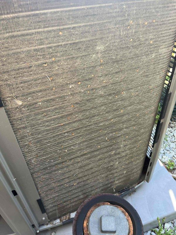 Performed comprehensive BFMA tune-up on 2+ year old air conditioning system. Upon arrival, found condenser coil heavily contaminated with dirt, dust, and organic debris accumulation affecting heat transfer efficiency. Completed full system inspection including cleaning of condenser coils, verification of refrigerant pressures, electrical connections inspection, and operational testing. Unit restored to proper working condition with improved airflow through coils and optimal performance parameters confirmed.