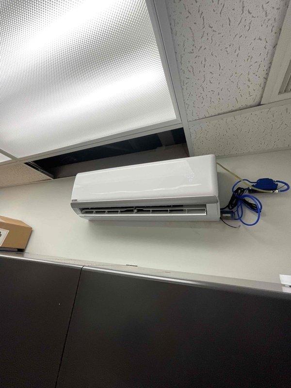 Conducted estimate on one-ton wall-mounted mini-split system in server room experiencing refrigerant loss. Inspected indoor unit and documented electrical panel configuration to assess system requirements and potential replacement options.