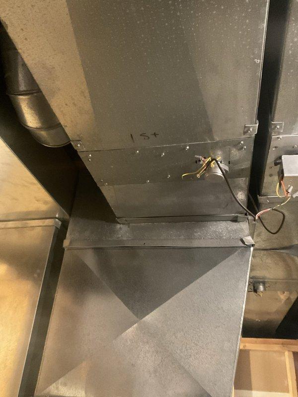 Responded to customer report of squeaking noise from basement air conditioning unit. Performed diagnostic inspection of indoor equipment and ductwork system. Inspected blower assembly, motor bearings, and belt drive components for signs of wear or misalignment. Examined sheet metal ductwork connections and support brackets for loose fasteners or metal-to-metal contact that could produce noise. Verified electrical connections and wiring at unit were secure. Documented system condition with measurements and photographs of ductwork and mechanical components for service records.