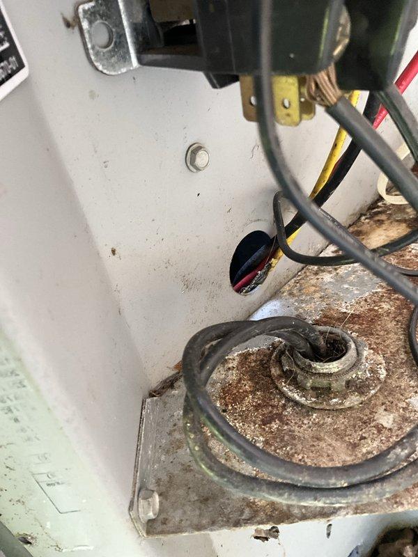 Completed comprehensive BFMA tune-up service on a 14-year-old air conditioning system during scheduled morning appointment. Performed thorough inspection of outdoor condensing unit, which exhibited significant weathering and exterior grime accumulation consistent with age and environmental exposure. Conducted detailed examination of internal components, noting substantial dirt and debris buildup within the unit base and on electrical connections. Cleaned condenser coils, removed accumulated debris from unit interior, and inspected all electrical connections including capacitor terminals and wiring. Verified proper refrigerant levels, tested system operation and airflow, and ensured all safety controls were functioning correctly. Unit returned to proper operating condition following standard preventive maintenance protocols.