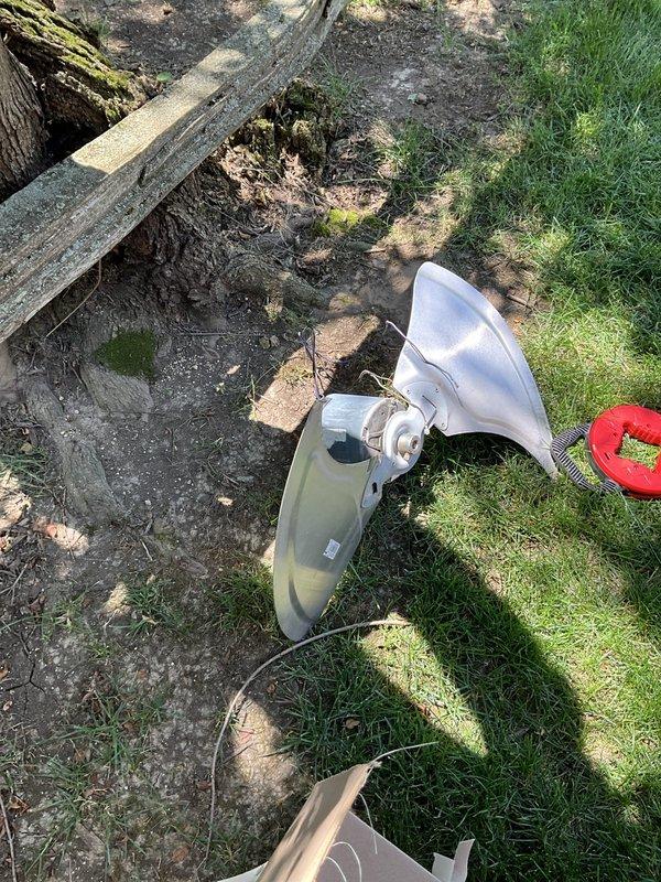 Replaced failed condenser fan motor, fan blade, and capacitor on outdoor heat pump unit. Removed old components, installed new OEM parts, and verified proper operation with successful unit startup and airflow test.