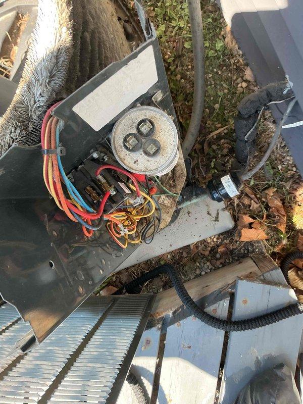 Completed comprehensive BFMA tune-up service on residential air conditioning system. Performed complete system inspection including outdoor condenser unit electrical disconnect box, verified all wire connections and electrical components, inspected capacitor and contactor operation. Examined condenser coil fins for proper airflow, checked refrigerant lines and connections for integrity. Inspected indoor air handler ductwork and insulation in basement mechanical room, verified all connections secure and properly sealed. System tested and operating within normal parameters upon completion of preventive maintenance service.
