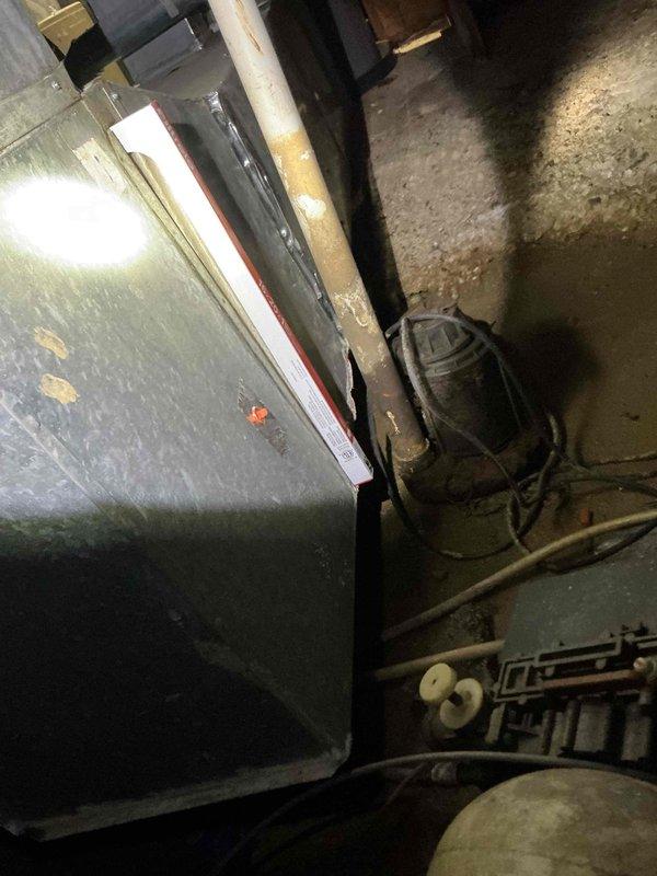 Completed comprehensive BFMA tune-up service on residential air conditioning system. Performed complete system inspection including outdoor condenser unit electrical disconnect box, verified all wire connections and electrical components, inspected capacitor and contactor operation. Examined condenser coil fins for proper airflow, checked refrigerant lines and connections for integrity. Inspected indoor air handler ductwork and insulation in basement mechanical room, verified all connections secure and properly sealed. System tested and operating within normal parameters upon completion of preventive maintenance service.