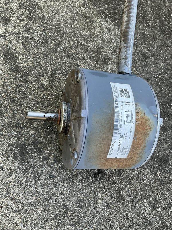 Completed warranty replacement of condenser fan motor on rooftop HVAC unit. Removed failed motor assembly from outdoor condensing unit, disconnected electrical connections, and installed new OEM replacement motor. Verified proper shaft alignment, secured mounting hardware, reconnected wiring per manufacturer specifications, and tested unit operation to confirm proper fan rotation and system functionality. Old motor removed from site and disposed of properly.