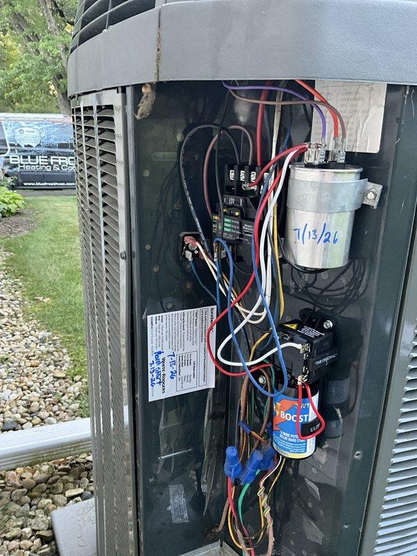 Responded to service call for air conditioning unit attempting to start but failing to operate properly. Upon arrival, observed unit experiencing icing condition with thermostat set to 76°F. Inspected outdoor condensing unit and internal electrical components including contactor, capacitor (previously serviced 7/13/24), and boost kit. Instructed customer to power down system to allow ice accumulation to thaw completely before further operation. Recommended follow-up contact to assess system performance once unit has defrosted.