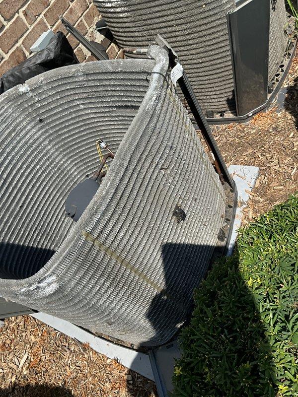 Completed comprehensive BFMA tune-up service on outdoor air conditioning condenser unit. Upon arrival, observed significant accumulation of dust, dirt, lint, and outdoor debris on condenser coil fins, which was restricting airflow and reducing system efficiency. Thoroughly cleaned condenser coils to remove all buildup and restore proper heat exchange capability. Performed complete system inspection including refrigerant lines, electrical connections, and mechanical components. Unit is now operating at optimal performance levels with improved airflow through clean condenser fins.