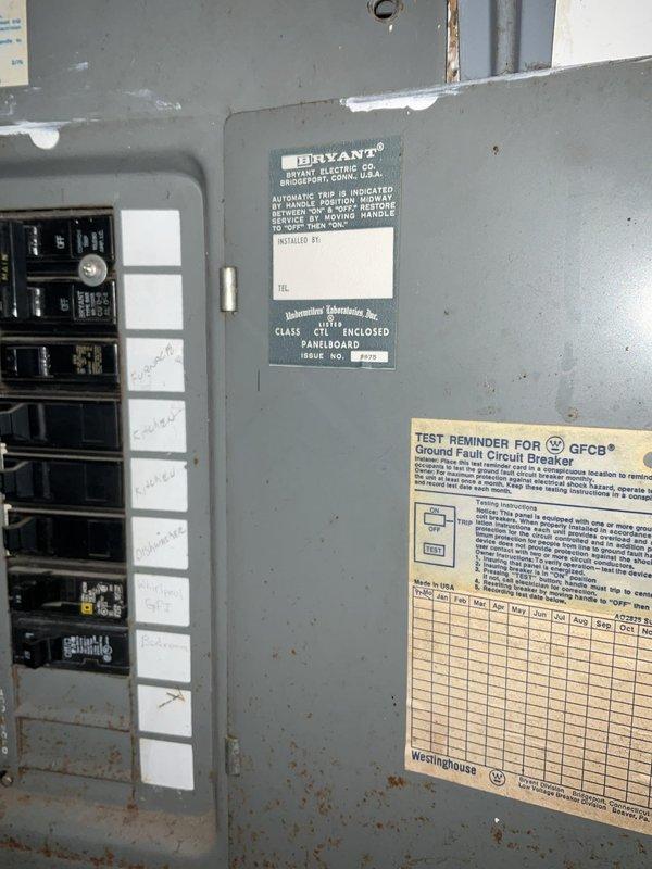 Conducted comprehensive full system HVAC estimate at residential property. Evaluated existing mechanical infrastructure including aged ductwork, refrigerant lines, and vertical pipe configurations in utility space. Assessed electrical service panel with multiple circuit breakers showing signs of wear and age, noting Ground Fault Circuit Breaker components and overall system capacity for new equipment compatibility. Documented current HVAC system layout including galvanized ductwork, insulated refrigerant lines, and mechanical space configuration to determine optimal replacement equipment specifications and installation requirements.