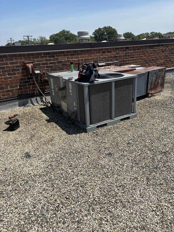 Responded to follow-up service call for rooftop HVAC unit that experienced icing issues during previous visit. Performed diagnostic inspection of system components including blower assembly and condensing units. Inspected blower wheel for proper operation, airflow restrictions, and debris accumulation that could contribute to reduced airflow and coil freezing. Evaluated both rooftop units for proper refrigerant levels, airflow, and mechanical operation to identify root cause of icing condition.