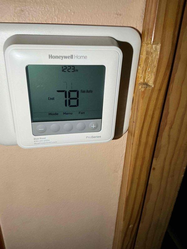 Completed non-member air conditioning tune-up on a one-year-old residential system. Performed comprehensive maintenance inspection of outdoor condenser unit and verified indoor thermostat operation, finding all components functioning properly with system cooling effectively to setpoint of 78 degrees.